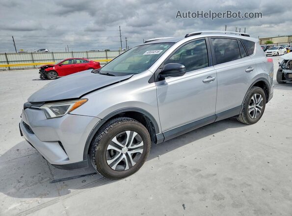 JTMZFREV9JJ158492 2018 TOYOTA RAV4 Серебряный Передняя левая четверть