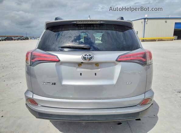 JTMZFREV9JJ158492 2018 TOYOTA RAV4 Серебряный Вид сзади