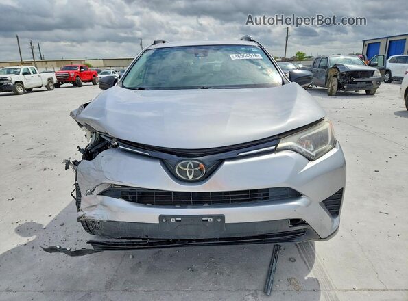 JTMZFREV9JJ158492 2018 TOYOTA RAV4 Серебряный Вид спереди