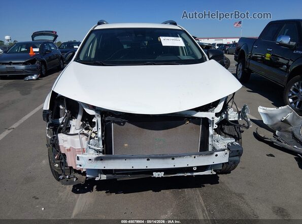 JTMZFREVXJJ154516 2018 TOYOTA RAV4 White Vista interior trasera