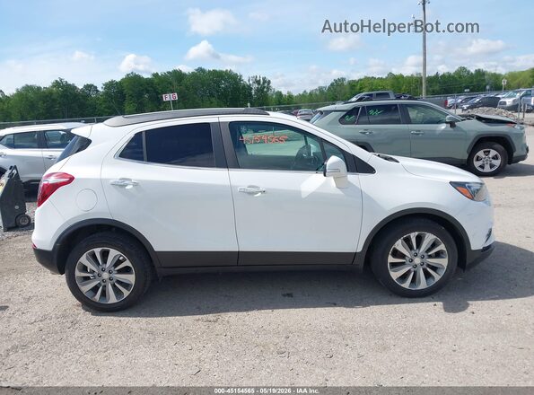 KL4CJASB3JB566720 2018 BUICK ENCORE White Vista interior trasera