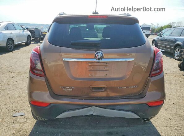 KL4CJASB8HB016911 2017 BUICK ENCORE Золотой Вид сзади
