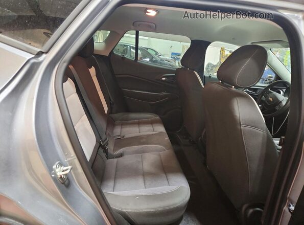 KL77LFE27RC122897 2024 CHEVROLET TRAX Серебряный Вид задней части салона