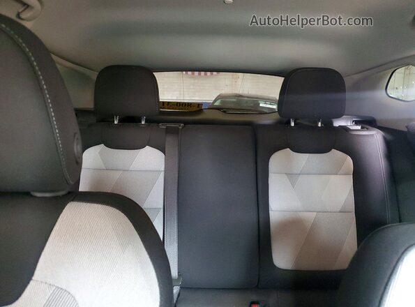 KL77LFE28RC246077 2024 CHEVROLET TRAX Black Rear seats view
