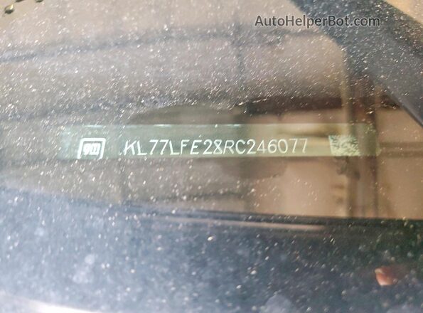 KL77LFE28RC246077 2024 CHEVROLET TRAX Black VIN sticker view