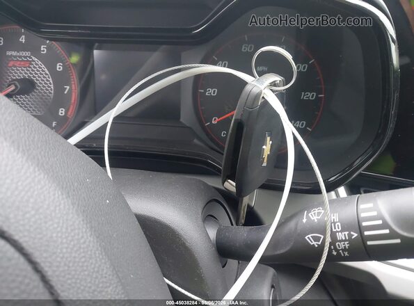 KL77LGEP8SC141367 2025 CHEVROLET TRAX Красный Вид панели приборов