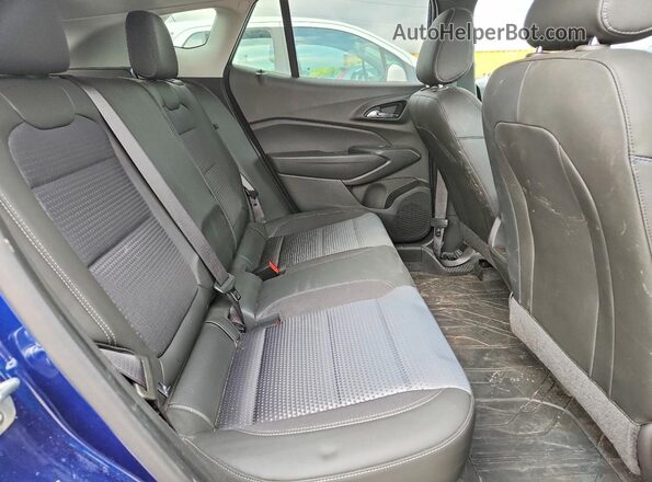 KL77LHE20RC225848 2024 CHEVROLET TRAX Синий Вид задней части салона