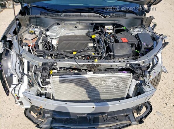 KL77LHE22RC064113 2024 CHEVROLET TRAX Серебряный Вид подкапотного пространства