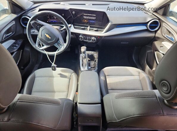 KL77LHE27RC059862 2024 CHEVROLET TRAX Белый Вид панели приборов