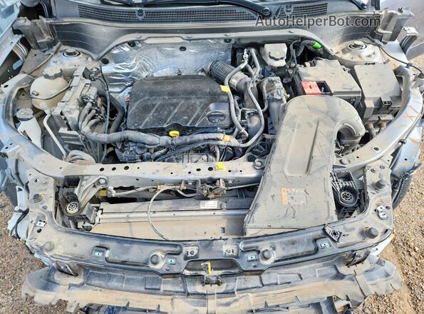 KL77LHE27RC238127 2024 CHEVROLET TRAX Серебряный Вид подкапотного пространства