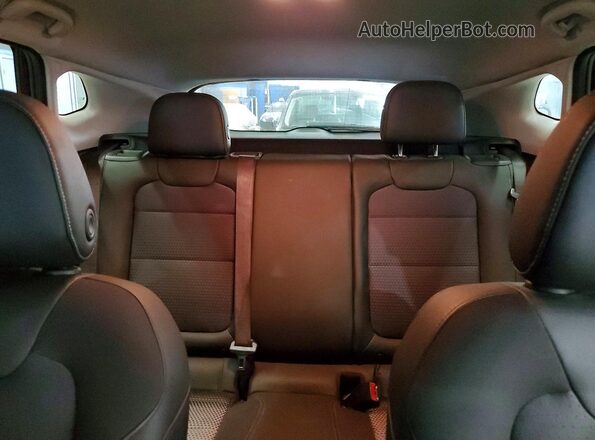 KL77LHE28RC038552 2024 CHEVROLET TRAX Red Vista de los asientos traseros