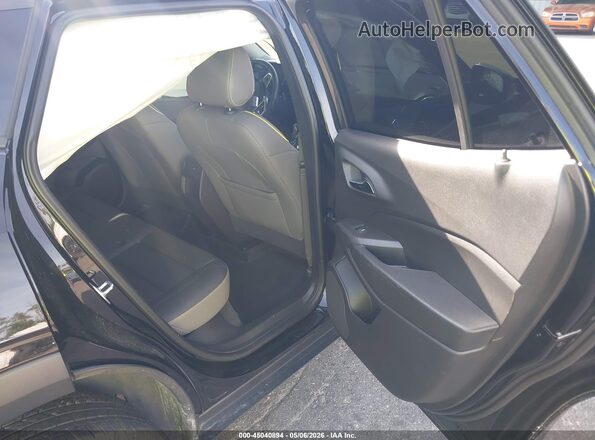 KL77LKE24RC110585 2024 CHEVROLET TRAX Черный Вид наклейки с VIN-кодом