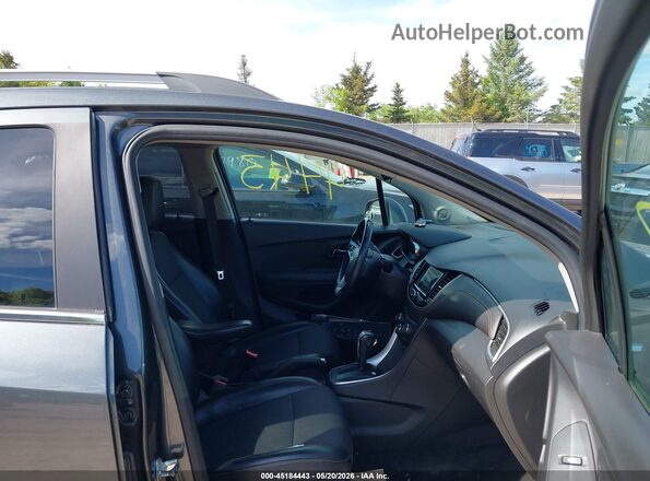 KL7CJPSB0JB584212 2018 CHEVROLET TRAX Серый Вид салона спереди