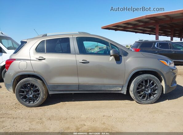 KL7CJPSM2NB531387 2022 CHEVROLET TRAX Золотой Вид задней части салона