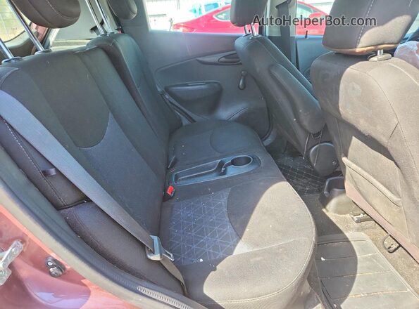 KL8CB6SAXKC766473 2019 CHEVROLET SPARK Maroon Rear seats view