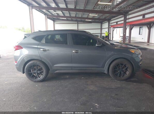 KM8J33A23GU087209 2016 HYUNDAI TUCSON Серый Вид задней части салона