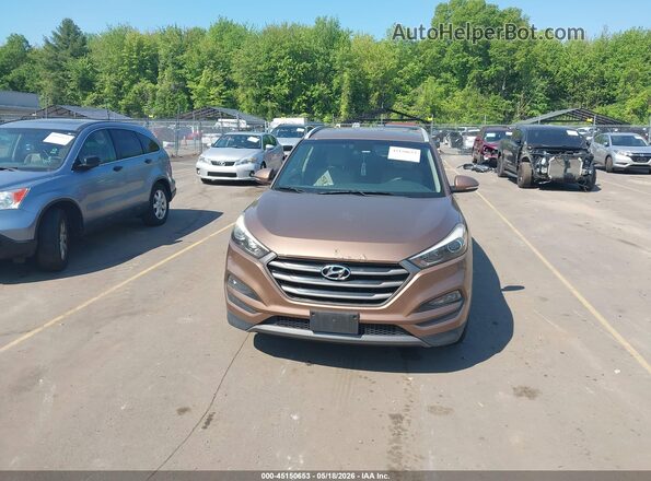 KM8J33A23GU181316 2016 HYUNDAI TUCSON Коричневый Вид щитка приборов