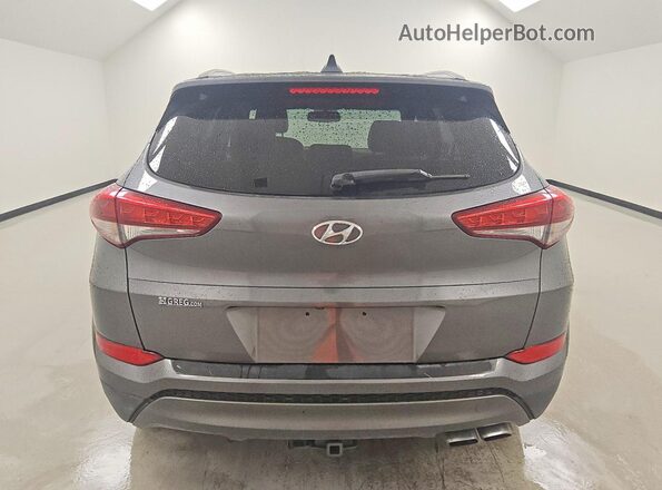 KM8J33A23GU199783 2016 HYUNDAI TUCSON Серый Вид сзади
