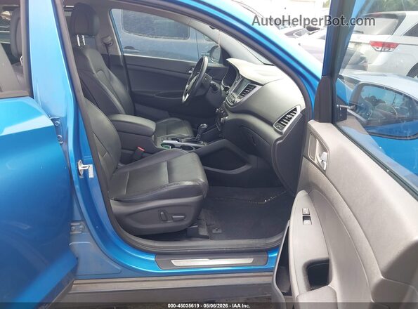 KM8J33A27GU140445 2016 HYUNDAI TUCSON Синий Вид салона спереди