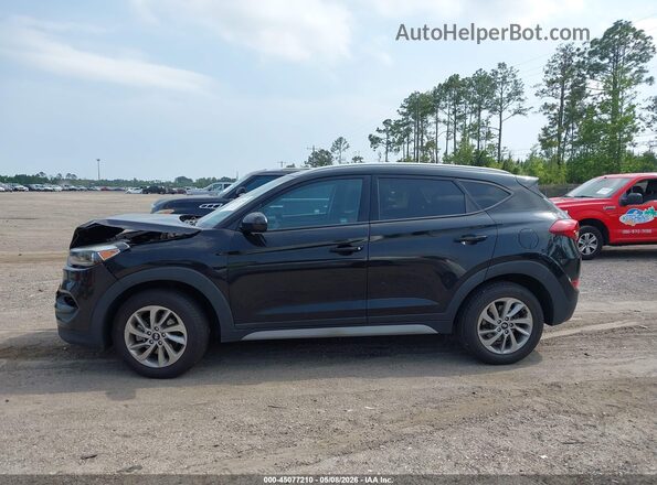 KM8J33A41HU409705 2017 HYUNDAI TUCSON Черный Вид задней части салона