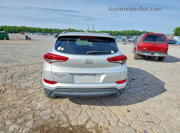 KM8J33A42JU633006 2018 HYUNDAI TUCSON Серебряный Вид сзади