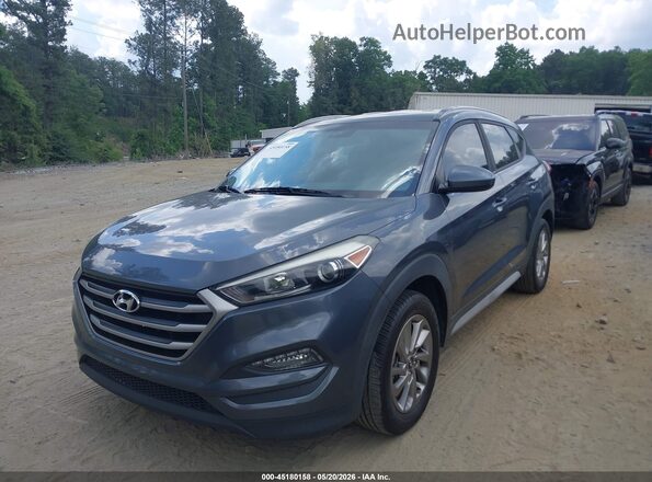 KM8J33A43JU677631 2018 HYUNDAI TUCSON Серый Передняя левая четверть