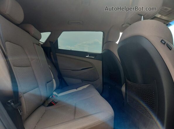 KM8J33A4XKU074886 2019 HYUNDAI TUCSON Белый Вид задней части салона