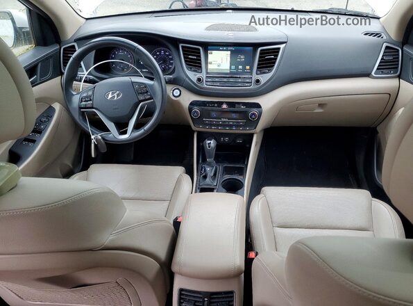 KM8J3CA27GU098200 2016 HYUNDAI TUCSON Белый Вид панели приборов
