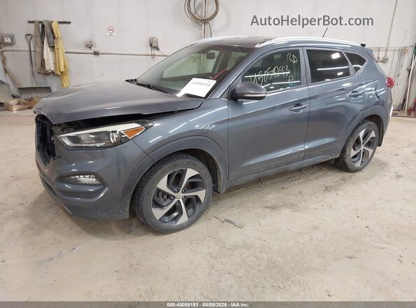 KM8J3CA27GU226502 2016 HYUNDAI TUCSON Серый Передняя левая четверть