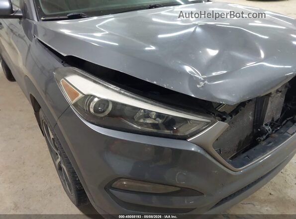 KM8J3CA27GU226502 2016 HYUNDAI TUCSON Серый 