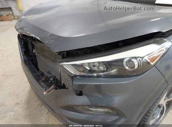 KM8J3CA27GU226502 2016 HYUNDAI TUCSON Серый 