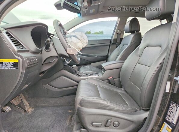 KM8J3CA2XGU221018 2016 HYUNDAI TUCSON Черный Вид салона спереди