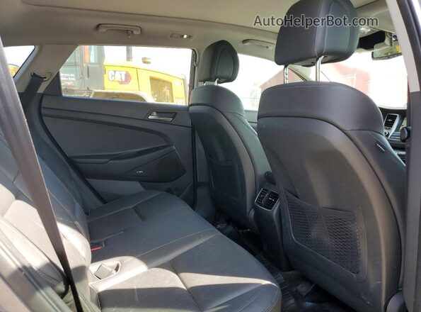 KM8J3CA44JU834566 2018 HYUNDAI TUCSON Серый Вид задней части салона