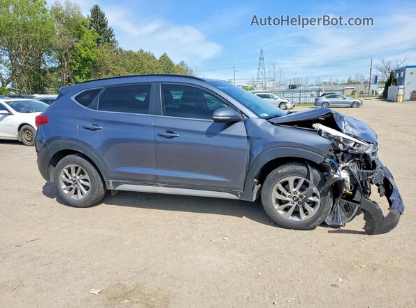 KM8J3CA44JU834566 2018 HYUNDAI TUCSON Серый Передняя правая четверть