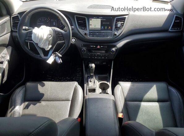 KM8J3CA44JU834566 2018 HYUNDAI TUCSON Серый Вид панели приборов