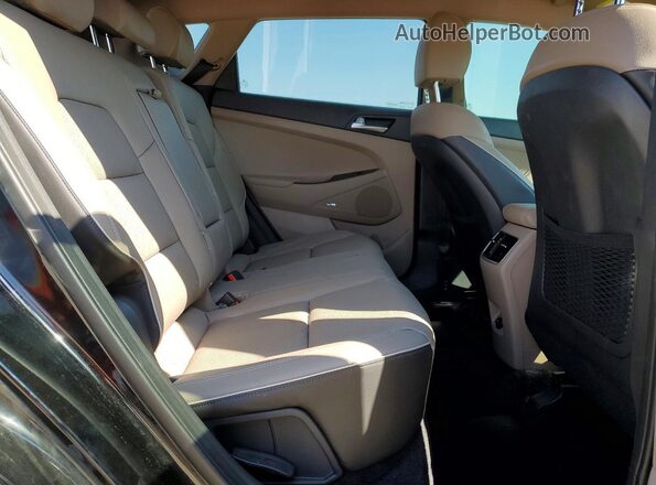KM8J3CAL4MU333818 2021 HYUNDAI TUCSON Black Vista interior trasera
