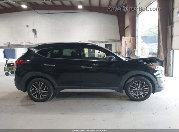 KM8J3CAL5LU161314 2020 HYUNDAI TUCSON Black Вид задньої частини салону