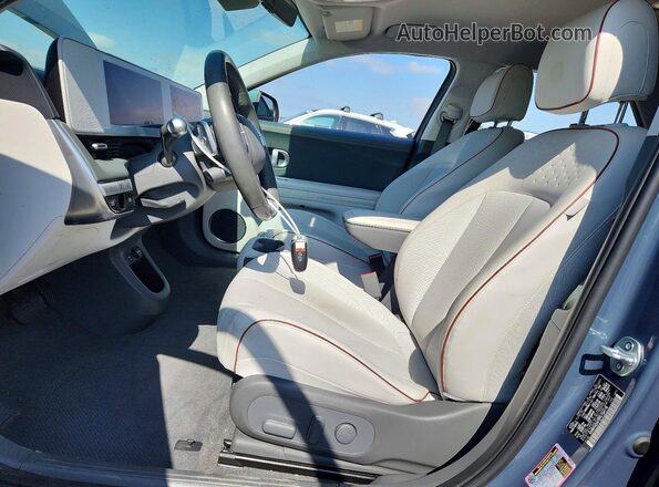 KM8KNDAF0PU154176 2023 HYUNDAI IONIQ Бирюзовый Вид салона спереди