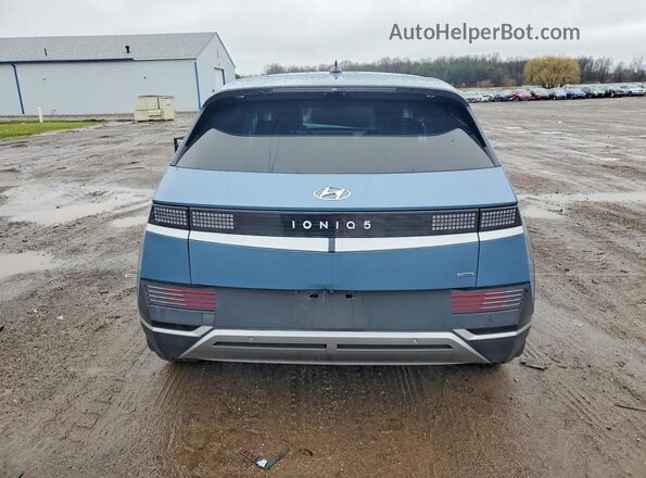 KM8KNDAF7PU206855 2023 HYUNDAI IONIQ Синий Вид сзади