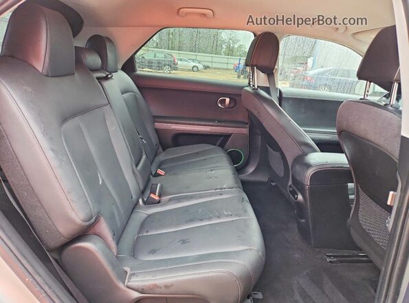 KM8KNDAF8PU149159 2023 HYUNDAI IONIQ Silver Rear seats view