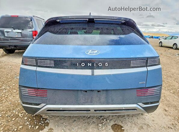 KM8KNDDF0RU284358 2024 HYUNDAI IONIQ Blue Rear view
