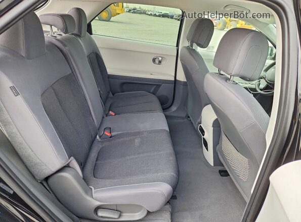 KM8KNDDF2RU299542 2024 HYUNDAI IONIQ Black Rear interior view