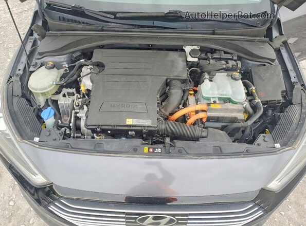 KMHC05LC4HU018839 2017 HYUNDAI IONIQ Серый Вид задней части салона
