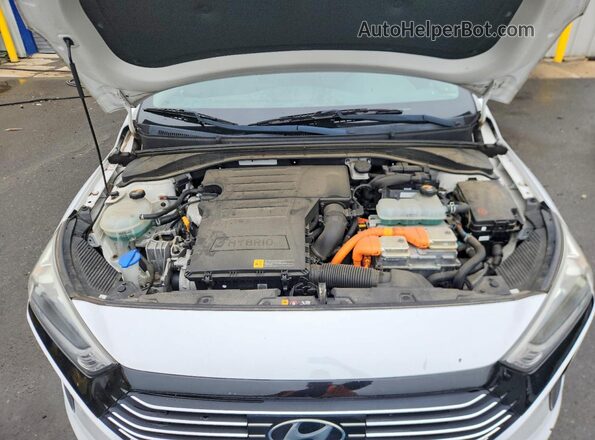 KMHC75LC2JU084551 2018 HYUNDAI IONIQ White Vista interior trasera