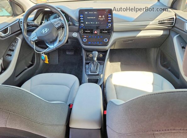 KMHC75LC9MU250987 2021 HYUNDAI IONIQ Burgundy Widok deski rozdzielczej