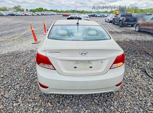 KMHCT4AE1GU967091 2016 HYUNDAI ACCENT Бежевый Вид сзади