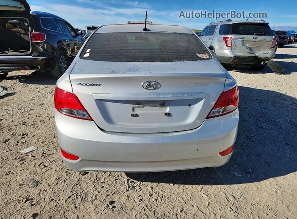 KMHCT4AE3GU161074 2016 HYUNDAI ACCENT Серебряный Вид сзади