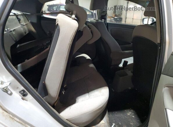 KMHCT4AE7GU061205 2016 HYUNDAI ACCENT Silver Rear seats view