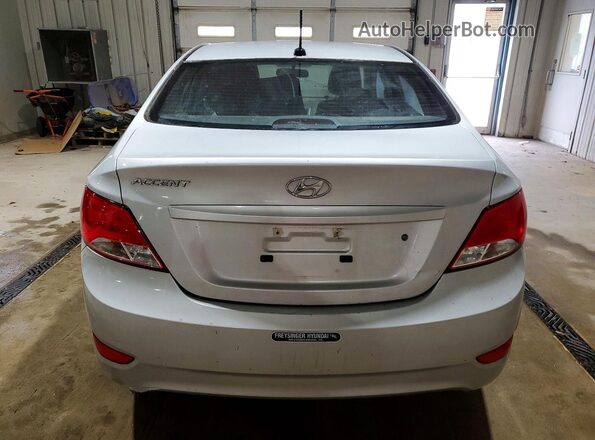 KMHCT4AE7GU061205 2016 HYUNDAI ACCENT Silver Rear view