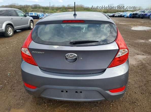 KMHCT5AE0HU310516 2017 HYUNDAI ACCENT Серый Вид сзади